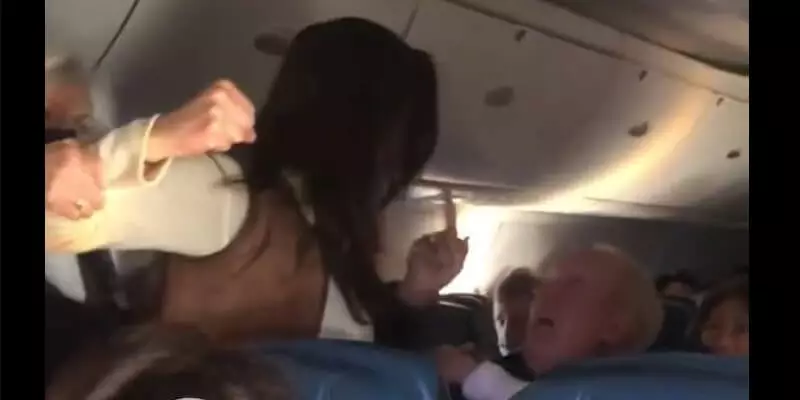 Woman on Airplane Punches Old Man